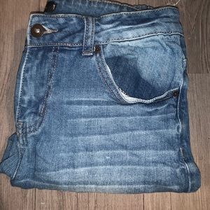 Rip jeans with high low ankles